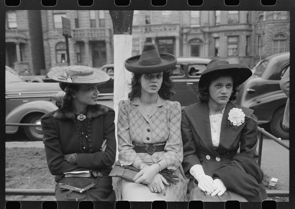 Girls waiting for Episcopal Church to end so they can see the processional, South Side of Chicago, Illinois by Russell Lee