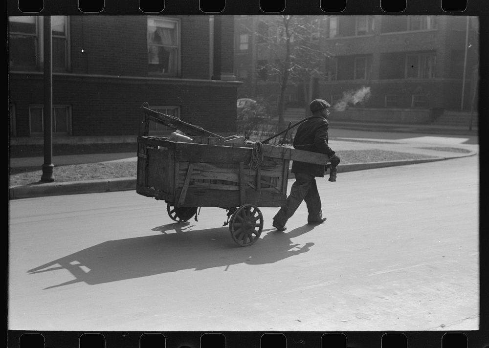 Man-drawn carts are common on South Side of Chicago, Illinois by Russell Lee