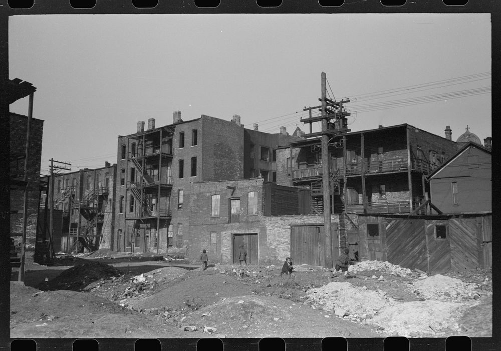 [Untitled photo, possibly related to: Vacant lots and apartment buildings in  section of Chicago, Illinois] by Russell Lee