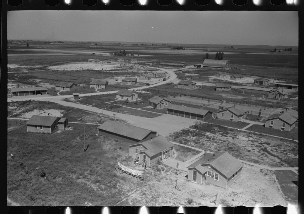 [Untitled photo, possibly related to: Homes of permanent farm workers at the FSA (Farm Security Administration) labor camp.…
