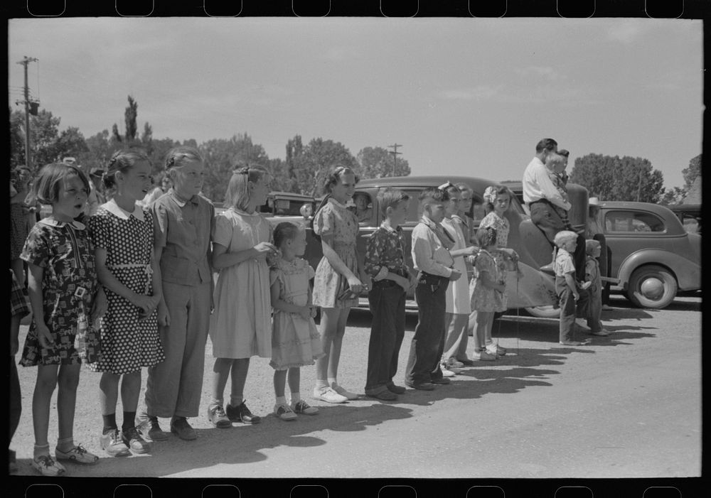 Watching the parade on the Fourth of July at Vale, Oregon by Russell Lee