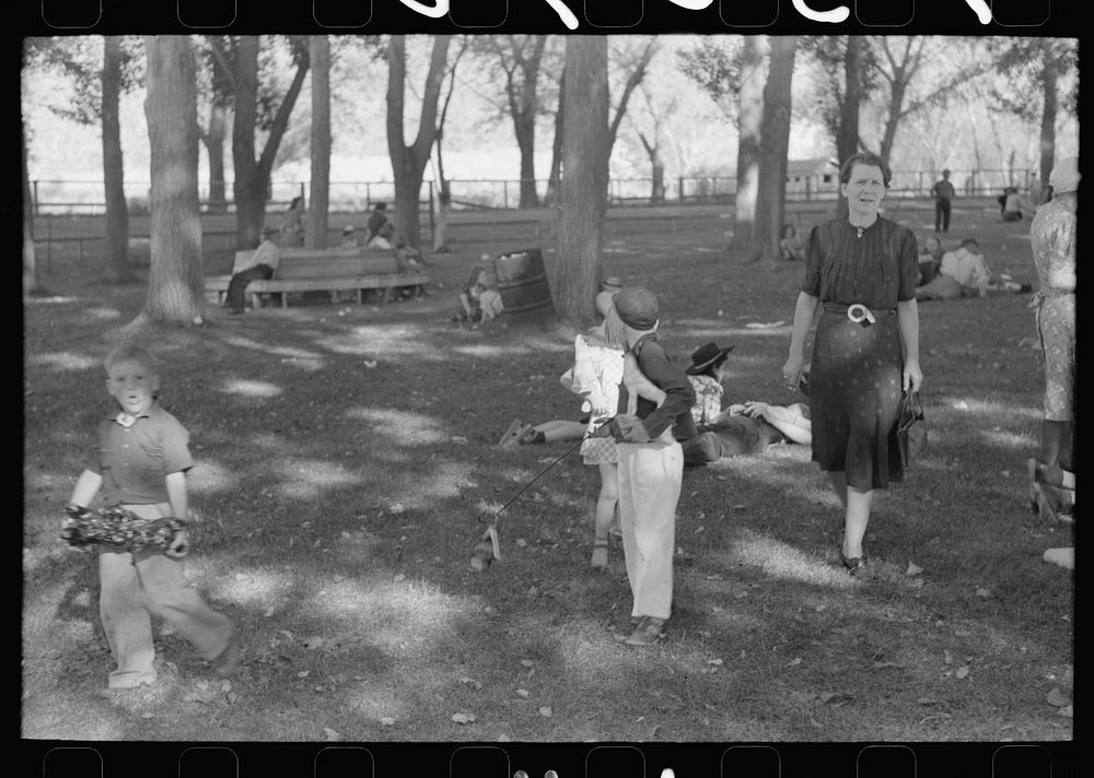 [Untitled photo, possibly related to: Tired picnickers, Fourth of July, Vale, Oregon] by Russell Lee