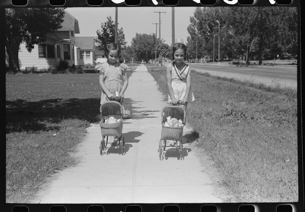 [Untitled photo, possibly related to: Little girls with their dolls and buggies. Caldwell, Idaho] by Russell Lee