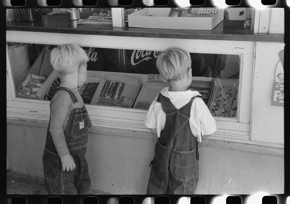 [Untitled photo, possibly related to: Little boys deciding what kind of candy they want to buy. Caldwell, Idaho] by Russell…