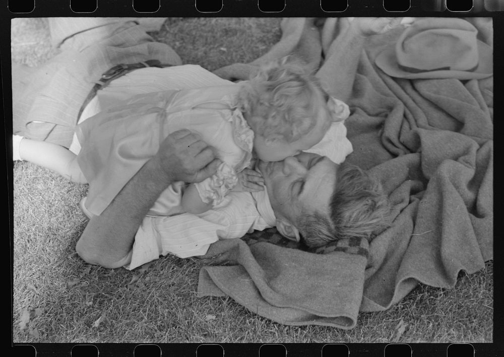 [Untitled photo, possibly related to: Farmer with his granddaughter at picnic on Fourth of July. Vale, Oregon] by Russell Lee