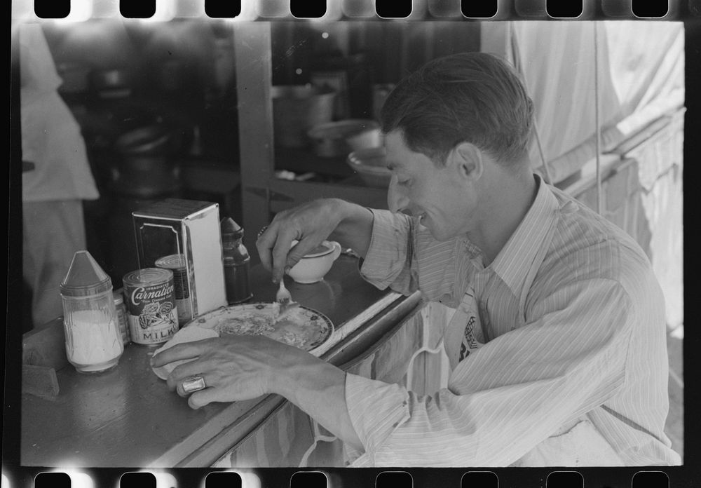 [Untitled photo, possibly related to: Lunch at carnival stand, Fourth of July, Vale, Oregon] by Russell Lee