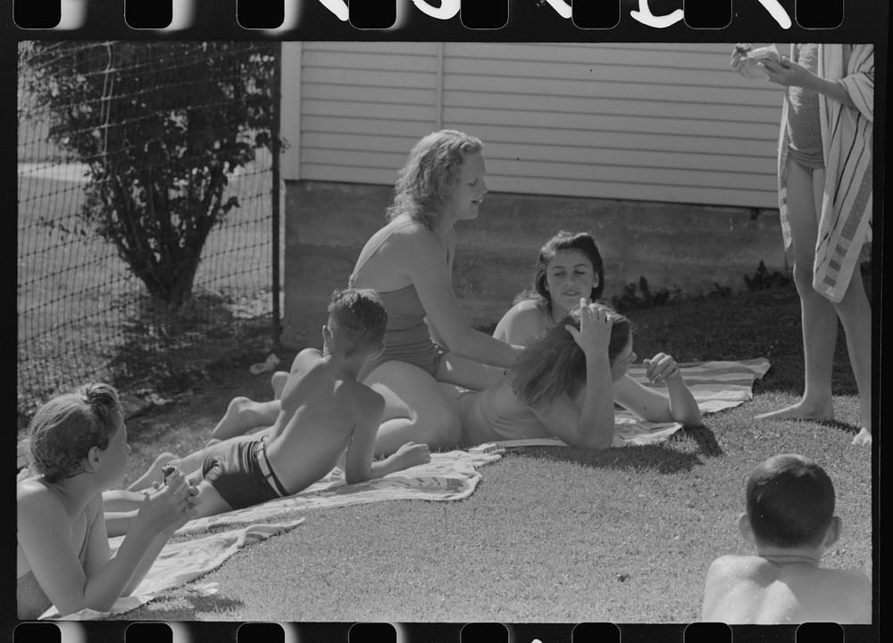[Untitled photo, possibly related to: Sun bathers at the park swimming pool, Caldwell, Idaho] by Russell Lee