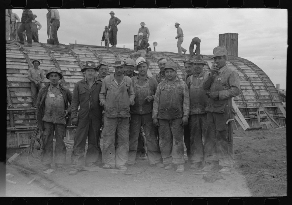 Workmen at Umatilla Ordnance Depot in front of igloo under construction, Hermiston, Oregon by Russell Lee