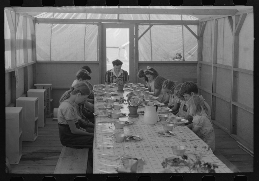 Lunch for children at the FSA (Farm Security Administration)'s mobile camp for migratory farm workers, Odell, Oregon by…