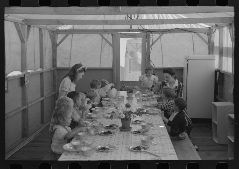 Lunch for children at the FSA (Farm Security Administration)'s mobile camp for migratory farm workers, Odell, Oregon by…