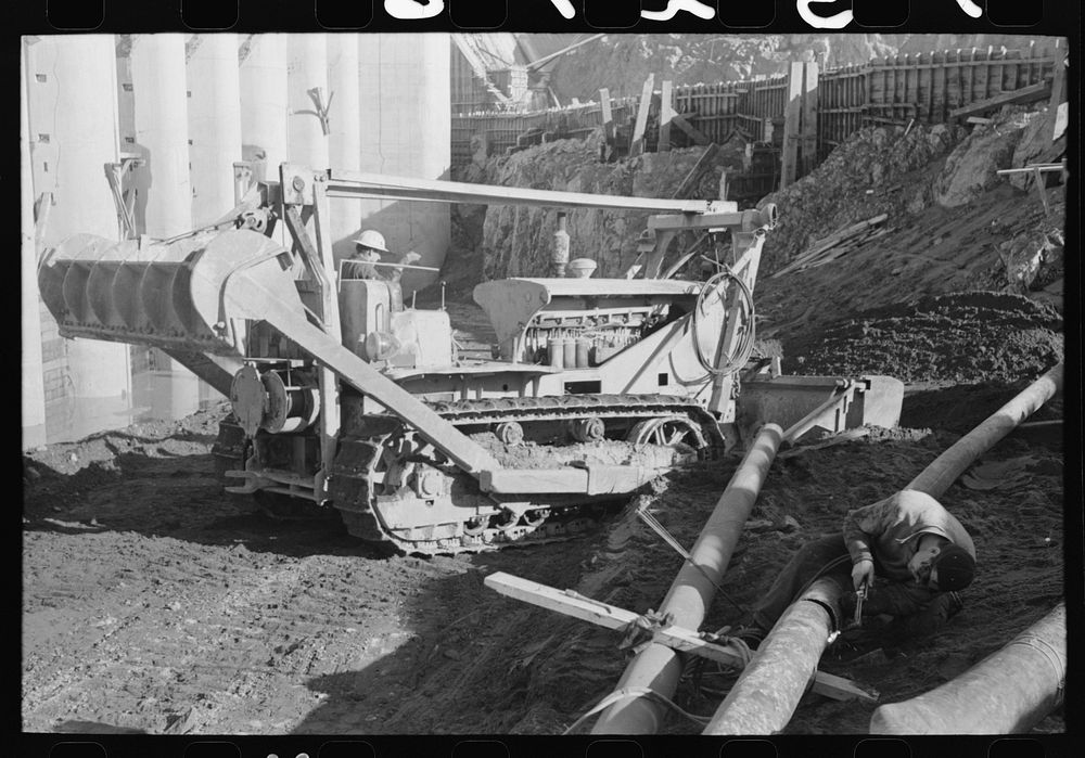 Bulldozer at work at Shasta Dam, Shasta County, California by Russell Lee