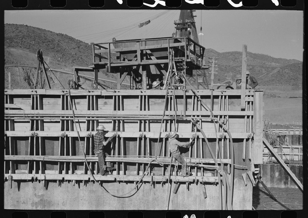 Working on forms for concrete at Shasta Dam, Shasta County, California by Russell Lee