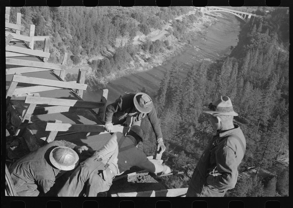 Putting concrete on Pit River Bridge which is above Shasta Dam, Shasta County, California by Russell Lee