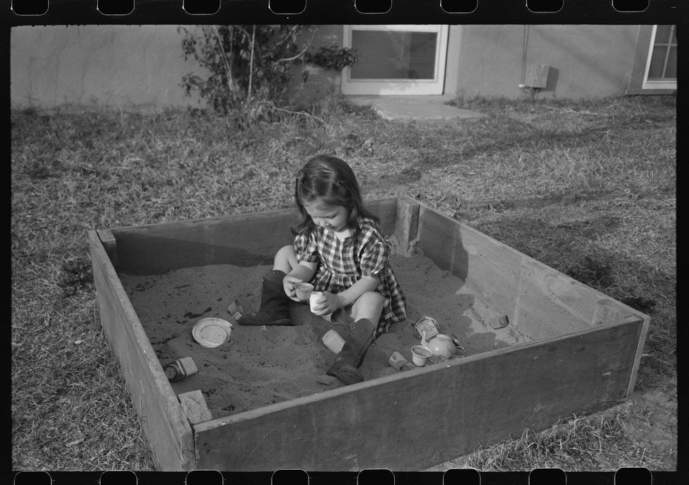 Child at the FSA (Farm Security Administration) Camelback Farms, Phoenix, Arizona by Russell Lee