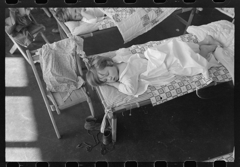 Nap time in the nursery school at the FSA (Farm Security Administration) farm workers community, Woodville, California by…