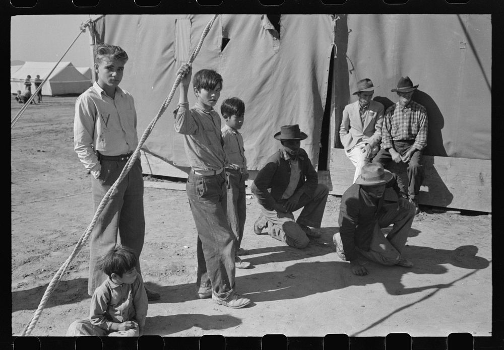 [Untitled photo, possibly related to: Agricultural workers play marbles. Yuma County, Arizona] by Russell Lee