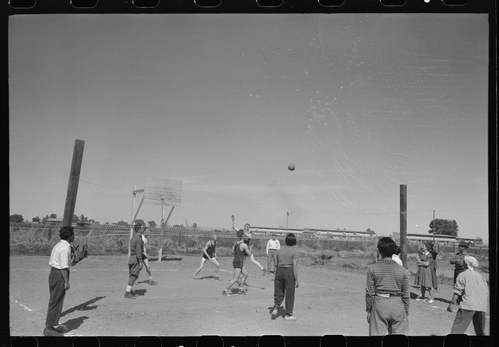 Volleyball game at the annual field day at the FSA (Farm Security Administration) farmworkers community, Yuma, Arizona by…