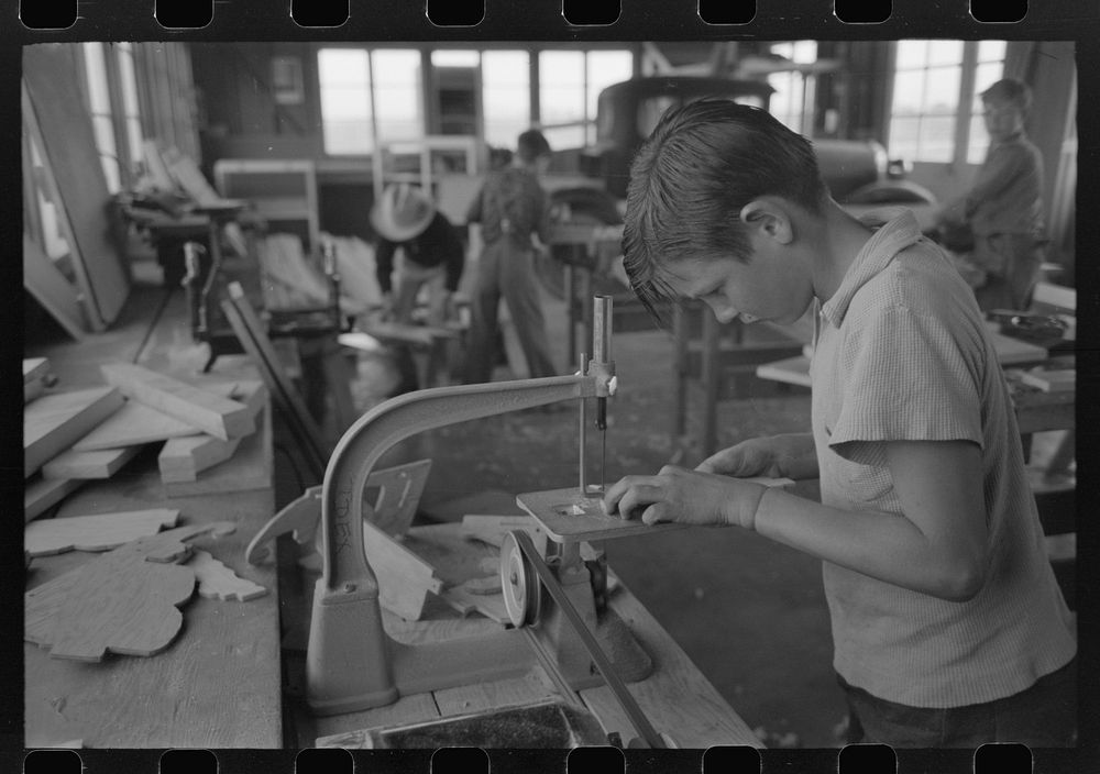 In the woodwork vocational training class, at the FSA (Farm Security Administration) farmworkers community, Eleven Mile…