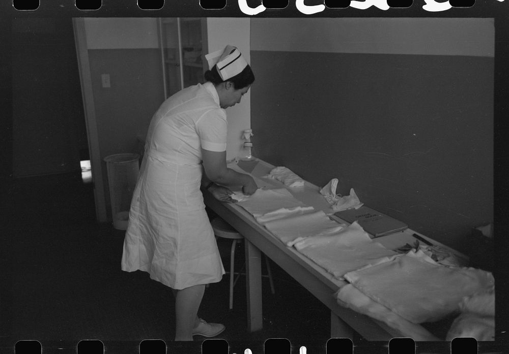 Surgery nurse at the Cairns General Hospital at the FSA (Farm Security Administration) farmworkers community, Eleven Mile…