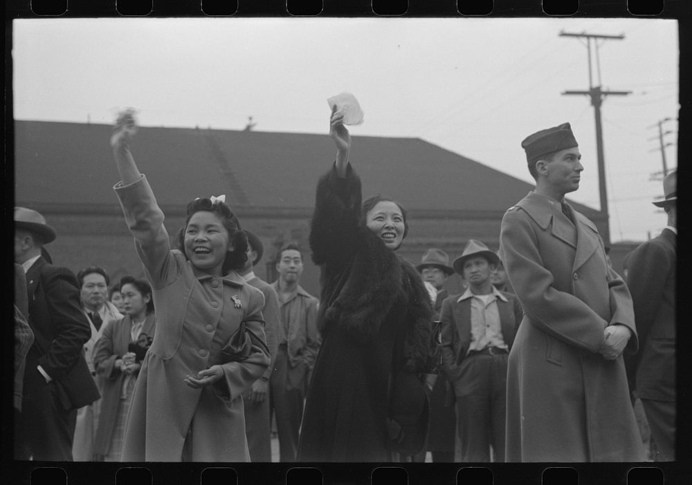 Los Angeles, California. Japanese-American evacuation from West Coast areas under U.S. Army war emergency order. Waving good…