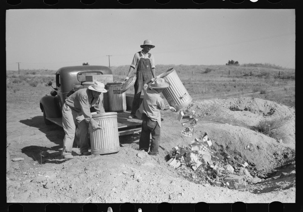 Nyssa, Oregon. FSA (Farm Security Administration) mobile camp. Japanese-Americans dumping garbage. All occupants of the camp…