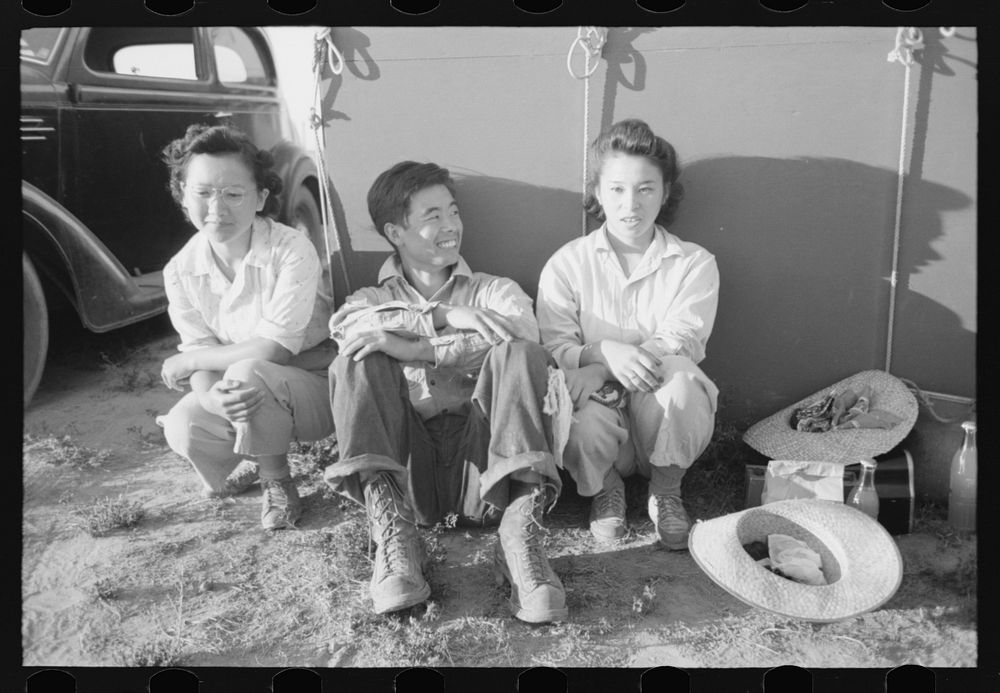 Nyssa, Oregon. FSA (Farm Security Administration) mobile camp. Japanese-American farm worker's family outside near the tent…