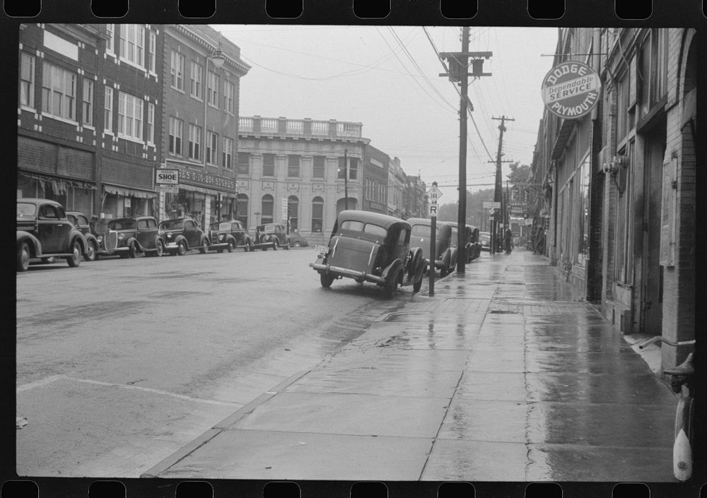 Rainy day on the main street of Roxboro, North Carolina. Sourced from the Library of Congress.