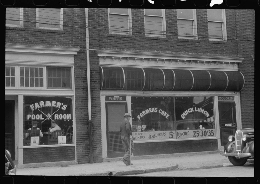[Untitled photo, possibly related to: A cafe near the tobacco market, Durham, North Carolina]. Sourced from the Library of…