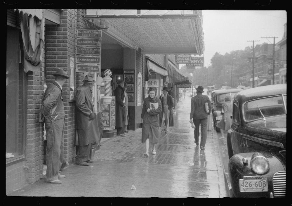 Rainy day on the main street of Roxboro, North Carolina. Sourced from the Library of Congress.
