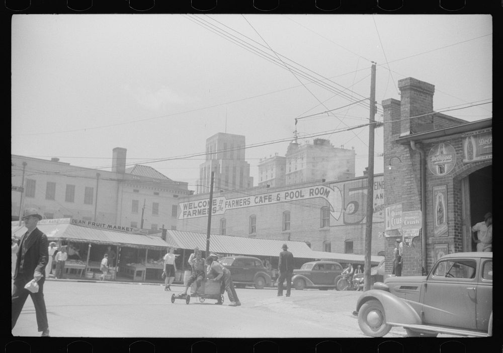[Untitled photo, possibly related to: [Outside of the tobacco warehouses in Durham, North Carolina]]. Sourced from the…