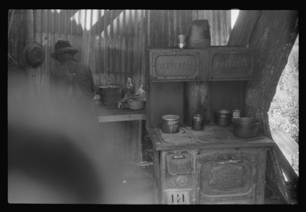 [Untitled photo, possibly related to: Cooking facilities for migrants during the strawberry season at Picket's Landing…