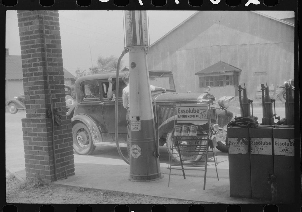 [Untitled photo, possibly related to: Migratory agricultural workers getting gas at the store in Camden, North Carolina].…
