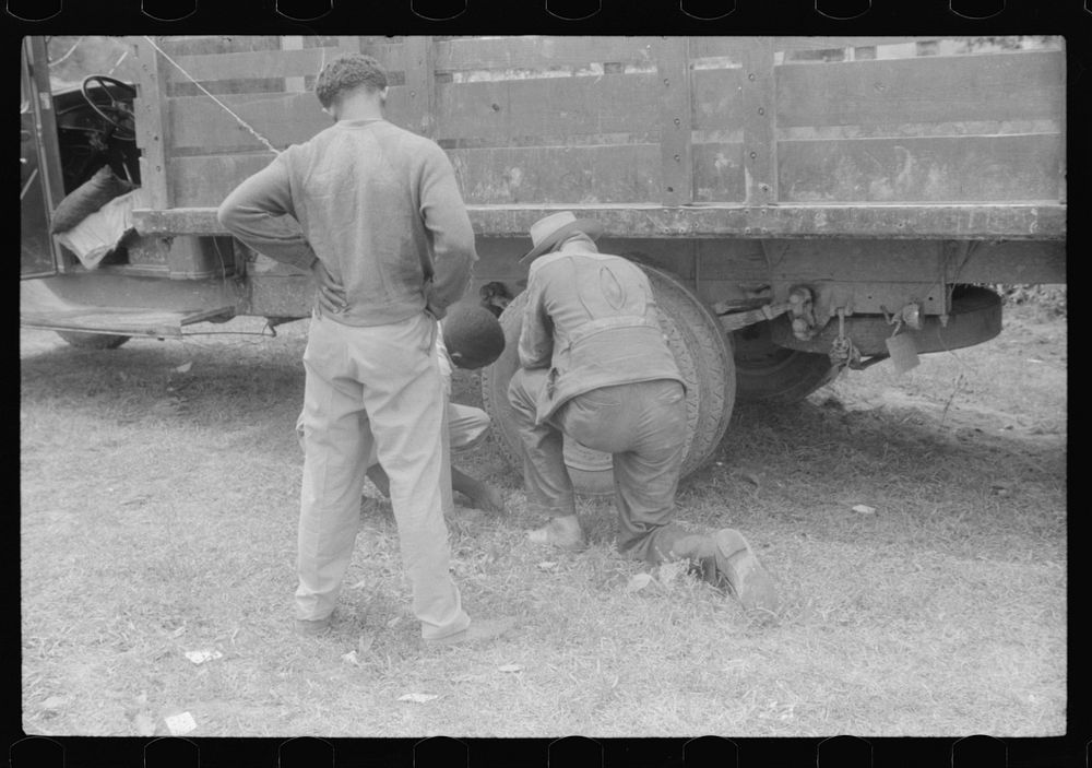 Migrant getting truck ready to leave Belcross, North Carolina for Onley, Virginia. Sourced from the Library of Congress.
