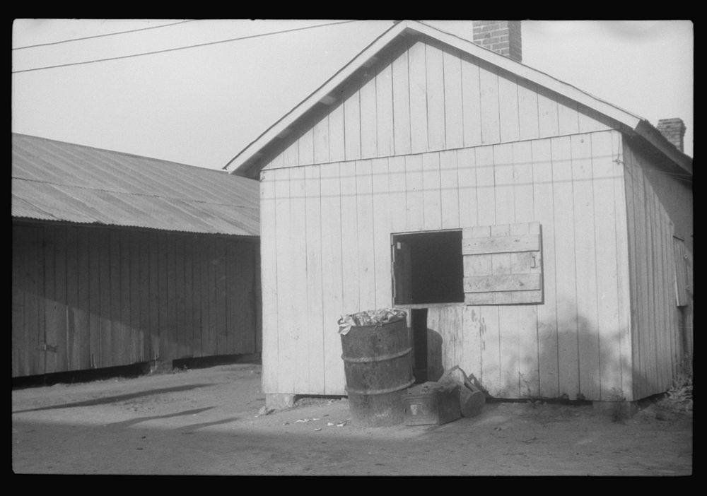 [Untitled photo, possibly related to: A cookhouse in the barracks for migratory workers at Webster Canning Company…