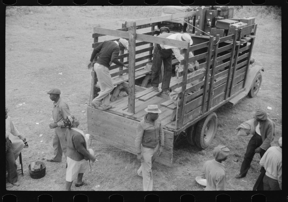 Migrants getting the truck ready to leave Belcross, North Carolina to another job at Onley, Virginia. Sourced from the…