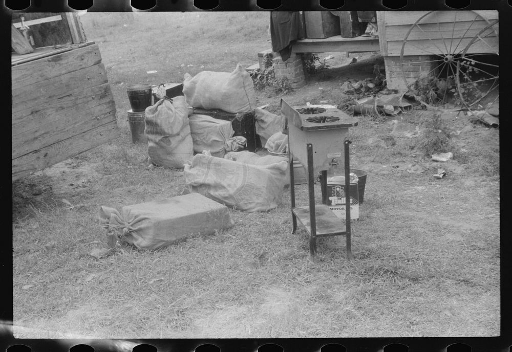 Household belongings of a crew of thirty-five migrants preparing to leave Belcross, North Carolina for another job at Onley…