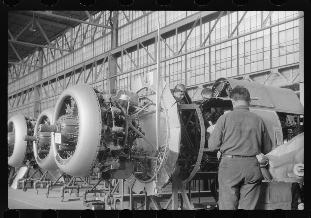 On the assembly line in the Vought-Sikorsky Aircraft Corporation, Stratford, Connecticut. Sourced from the Library of…