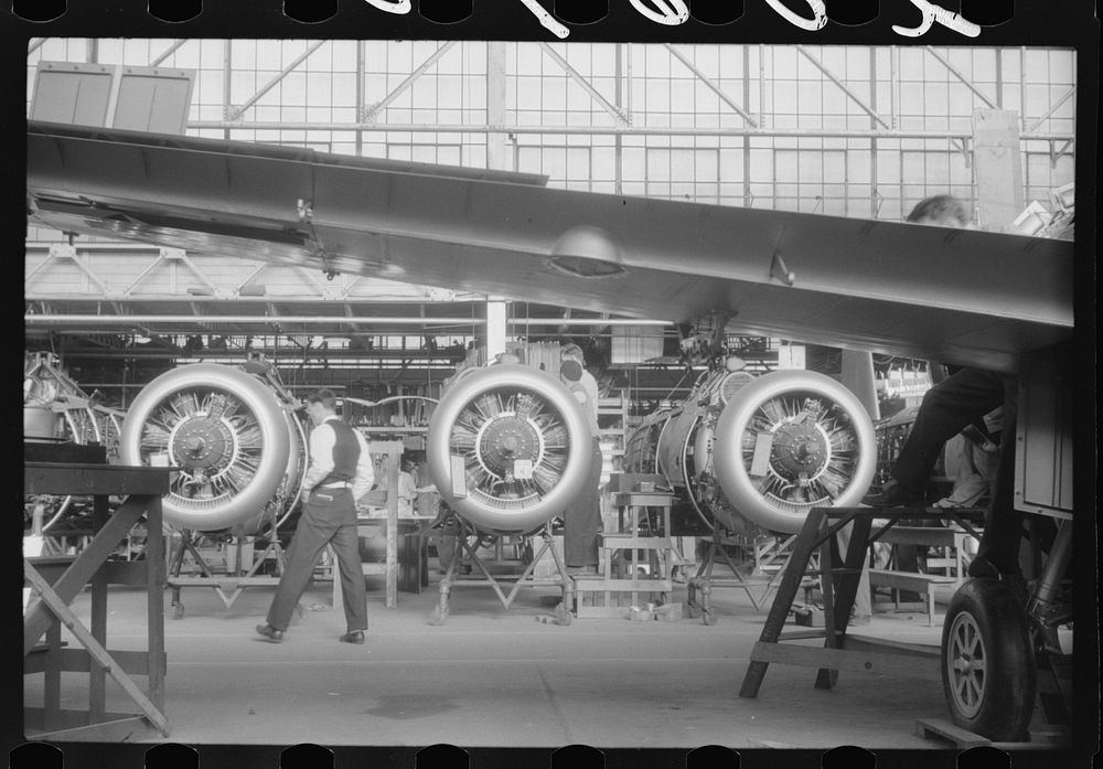 At one of the final assembly stages in the Vought-Sikorsky Aircraft Corporation, Stratford, Connecticut. Sourced from the…