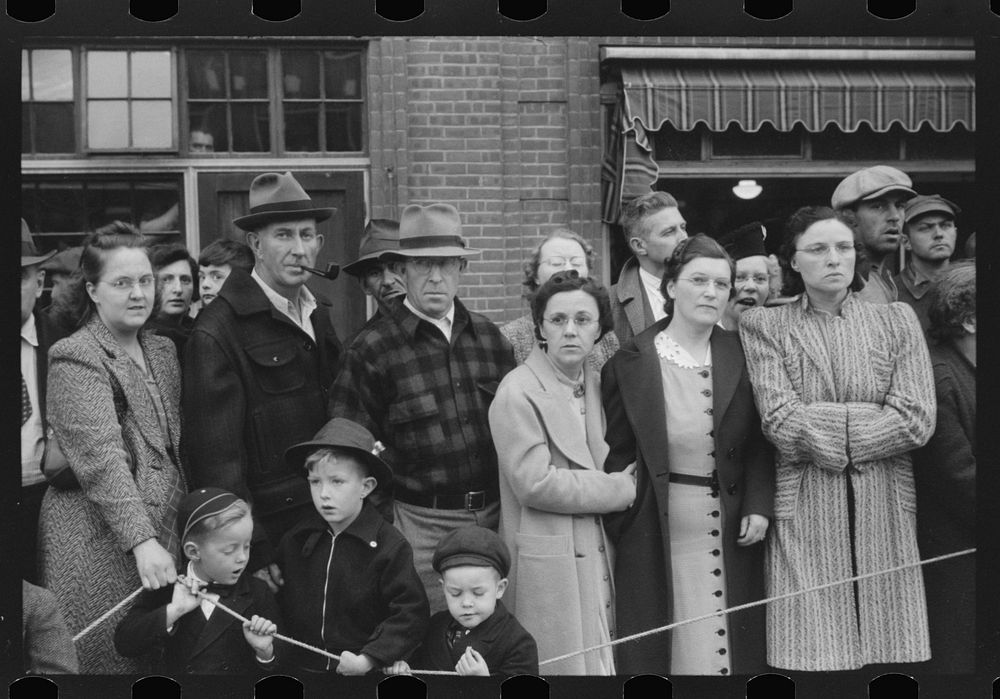 Spectators at the annual barrel rolling contest in Presque Isle, Maine. Sourced from the Library of Congress.