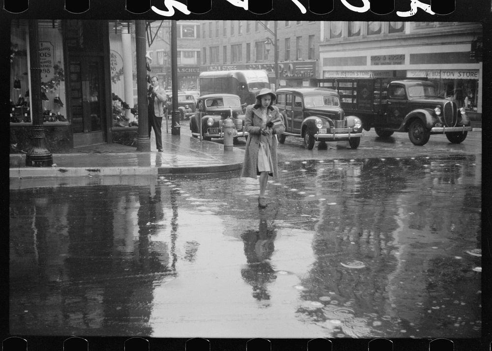 [Untitled photo, possibly related to: Main street intersection in Norwich, Connecticut on a rainy day]. Sourced from the…