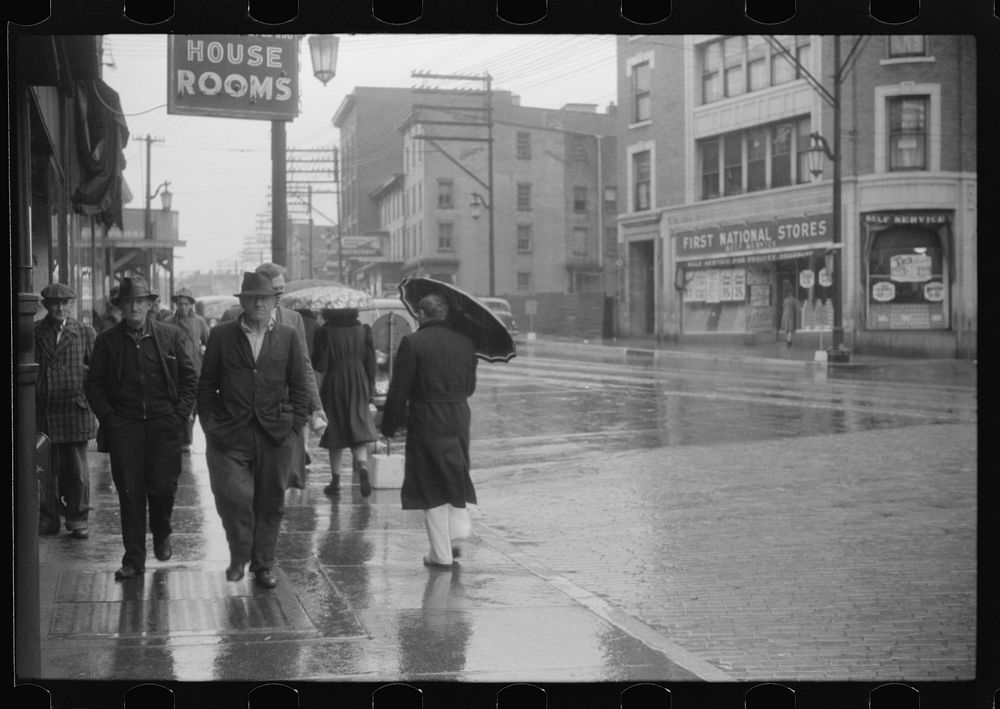 Street scene on a rainy day in Norwich, Connecticut. Sourced from the Library of Congress.