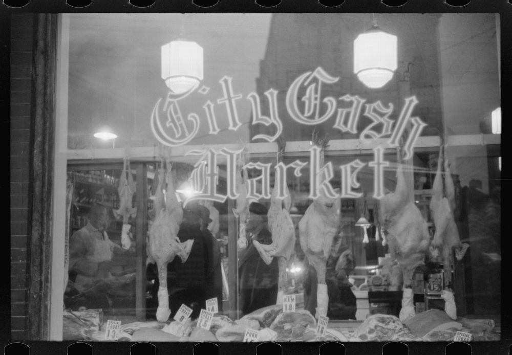 [Untitled photo, possibly related to: A butcher shop window at Thanksgiving time. Norwich, Connecticut]. Sourced from the…