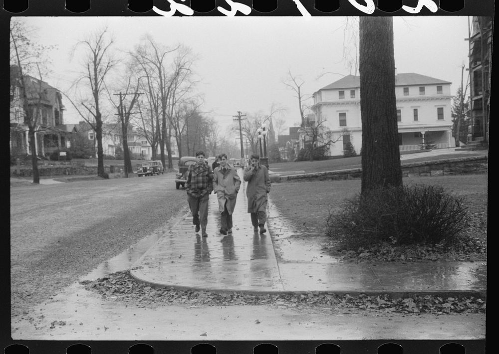 [Untitled photo, possibly related to: Coming home from school on a rainy day in Norwich, Connecticut]. Sourced from the…