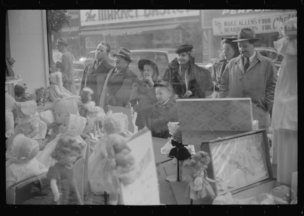 [Untitled photo, possibly related to: Window shoppers watching toy display in downtown Providence, Rhode Island]. Sourced…