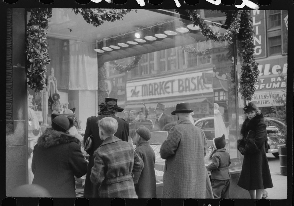 [Untitled photo, possibly related to: Window shoppers watching toy display in downtown Providence, Rhode Island]. Sourced…