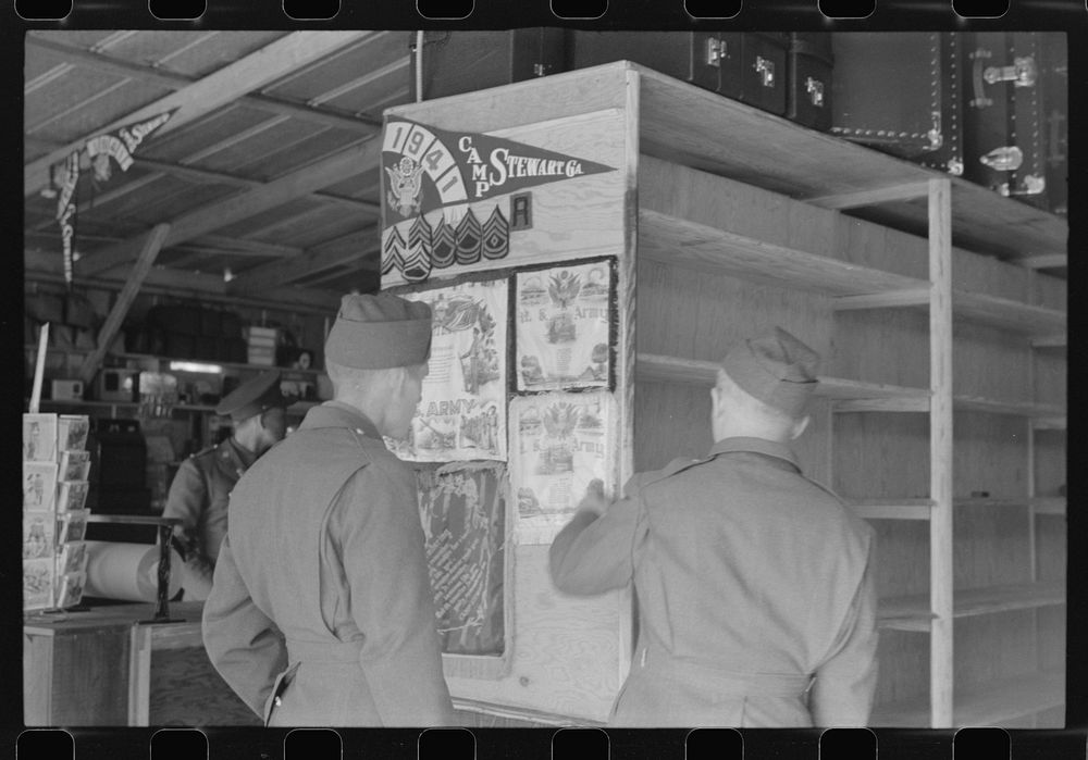 [Untitled photo, possibly related to: Souvenirs for sale at a new novelty goods store just outside Camp Stewart, near…