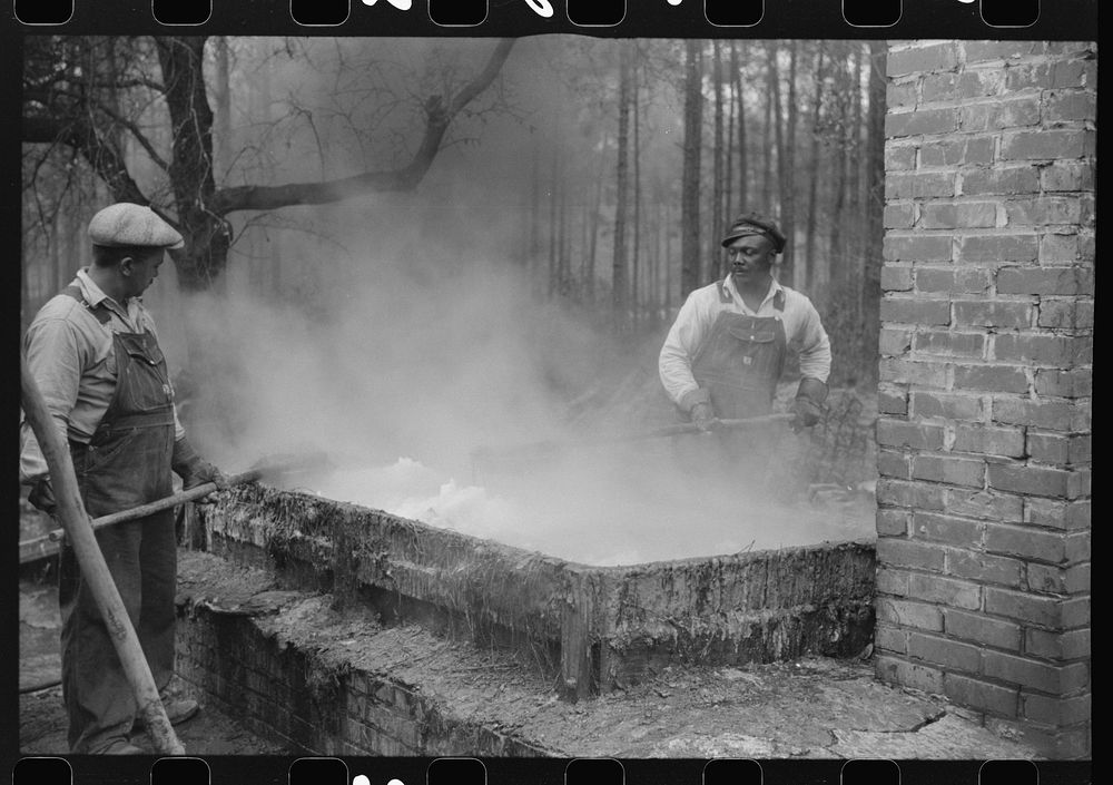 [Untitled photo, possibly related to: Cleaning turpentine cups in boiling water at a still near Pembroke, Georgia]. Sourced…