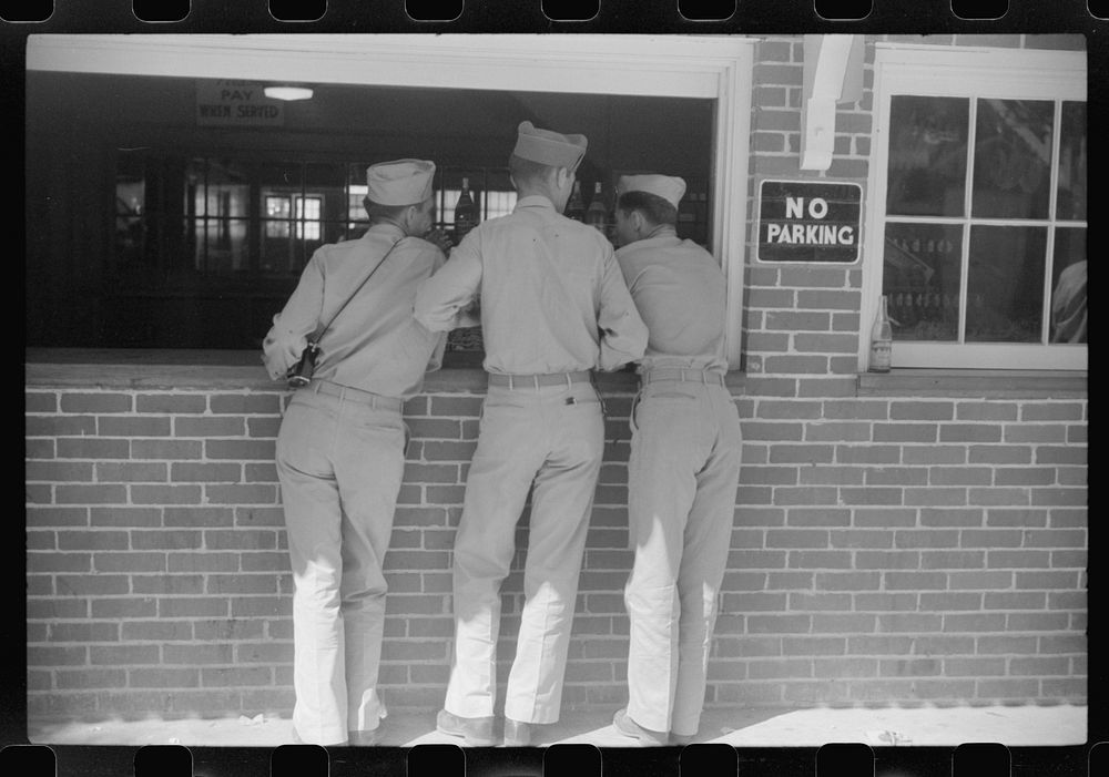 [Untitled photo, possibly related to: Soldiers from Fort Benning having a "coke" at Idle Hour park near Phenix City…