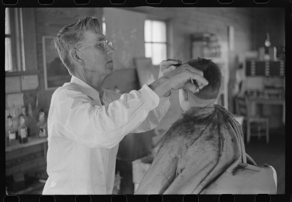 Mr. J.H. Parham, barber and notary public in Centralhatchee, Heard County, Georgia. Sourced from the Library of Congress.