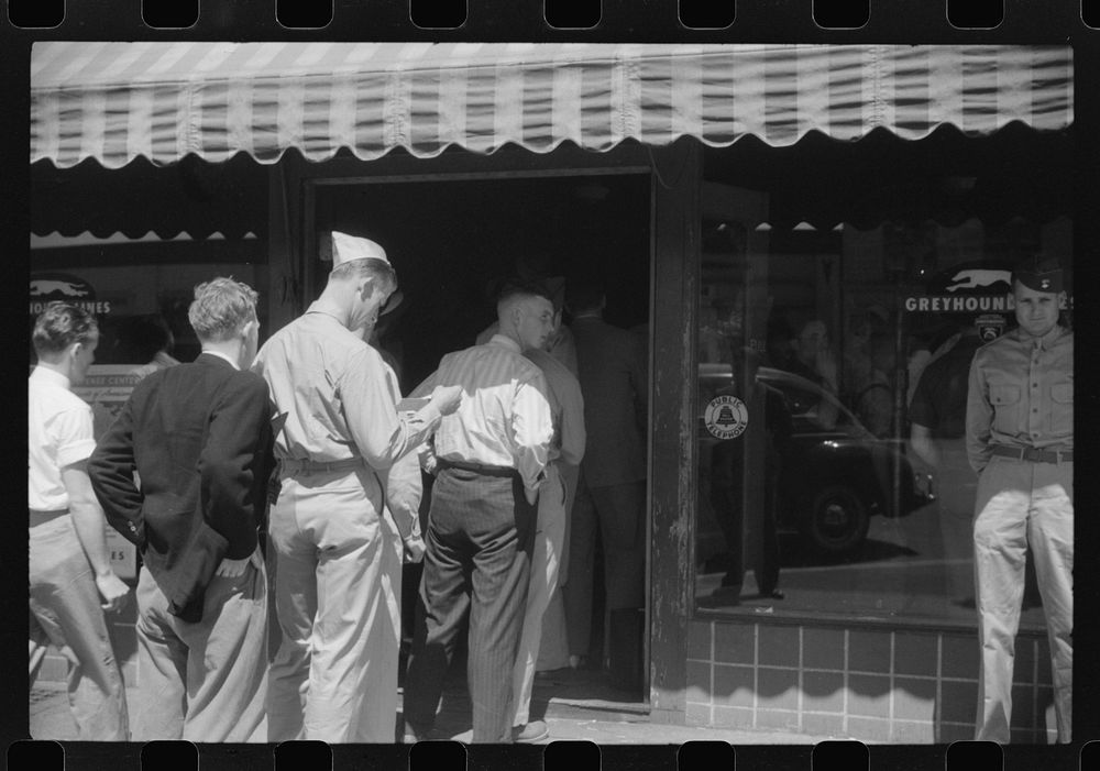 [Untitled photo, possibly related to: Soldiers from Fort Benning at the bus terminal in Columbus, Georgia]. Sourced from the…